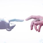 Robot hand reaching towards a human hand
